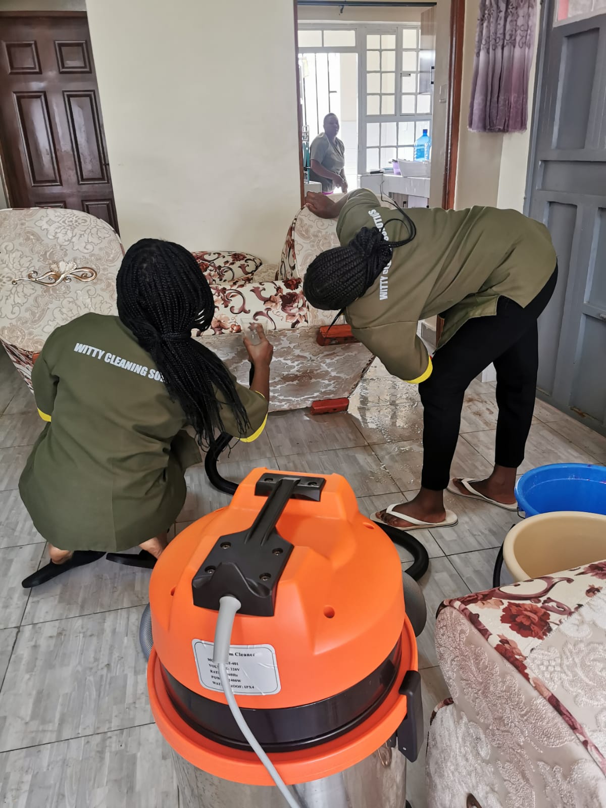 Witty Cleaning Solutions team at work in a home